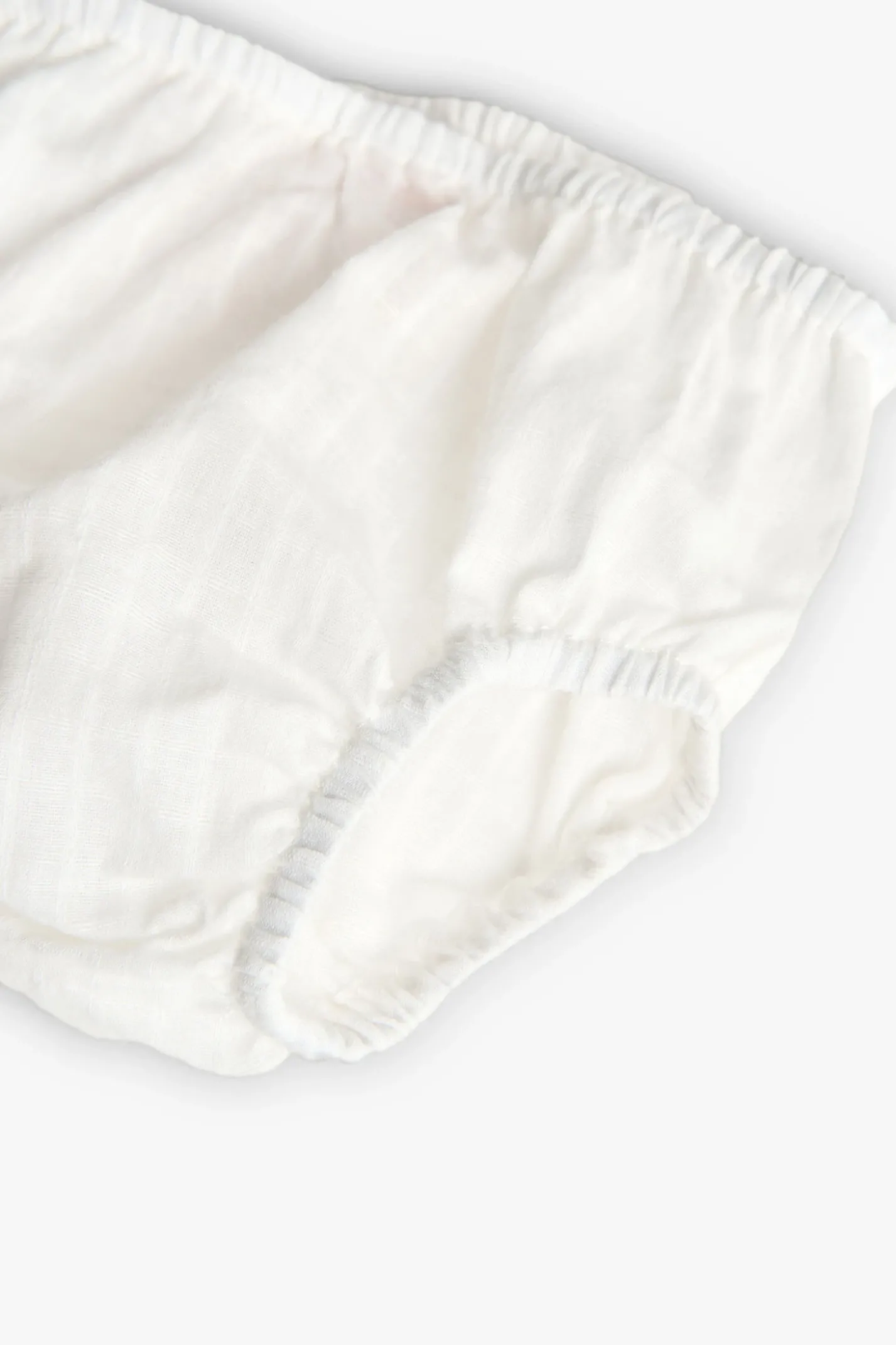 Abito in maglia per neonata di colore bianco