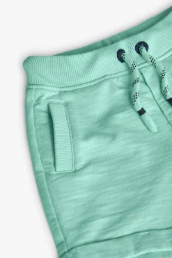 Bermuda a maglia per bambino in colore verde
