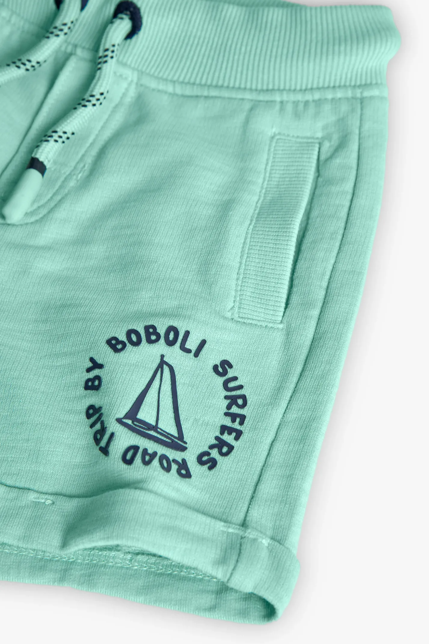 Bermuda a maglia per bambino in colore verde