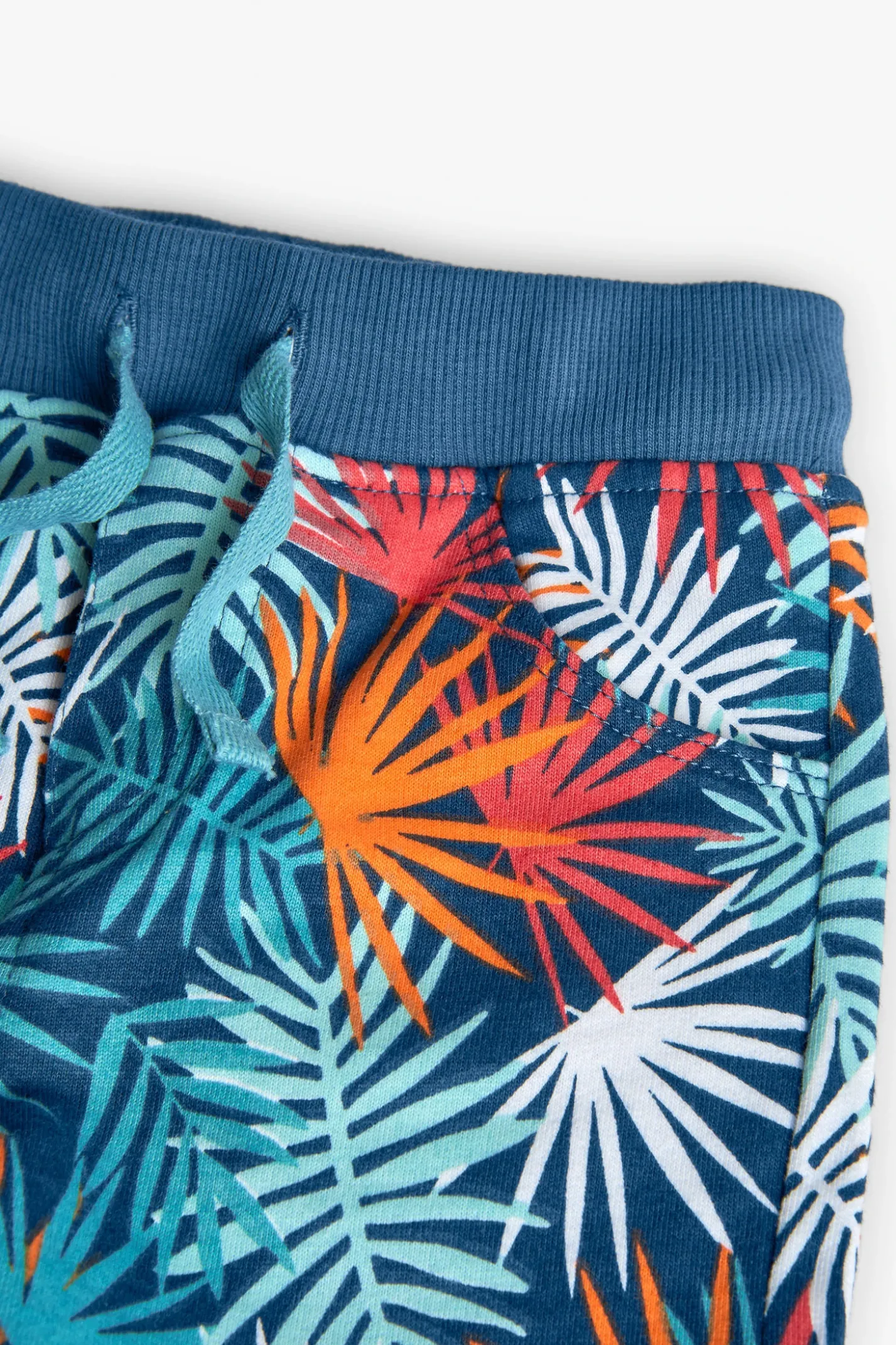Bermuda a maglia per neonato con stampa tropicale