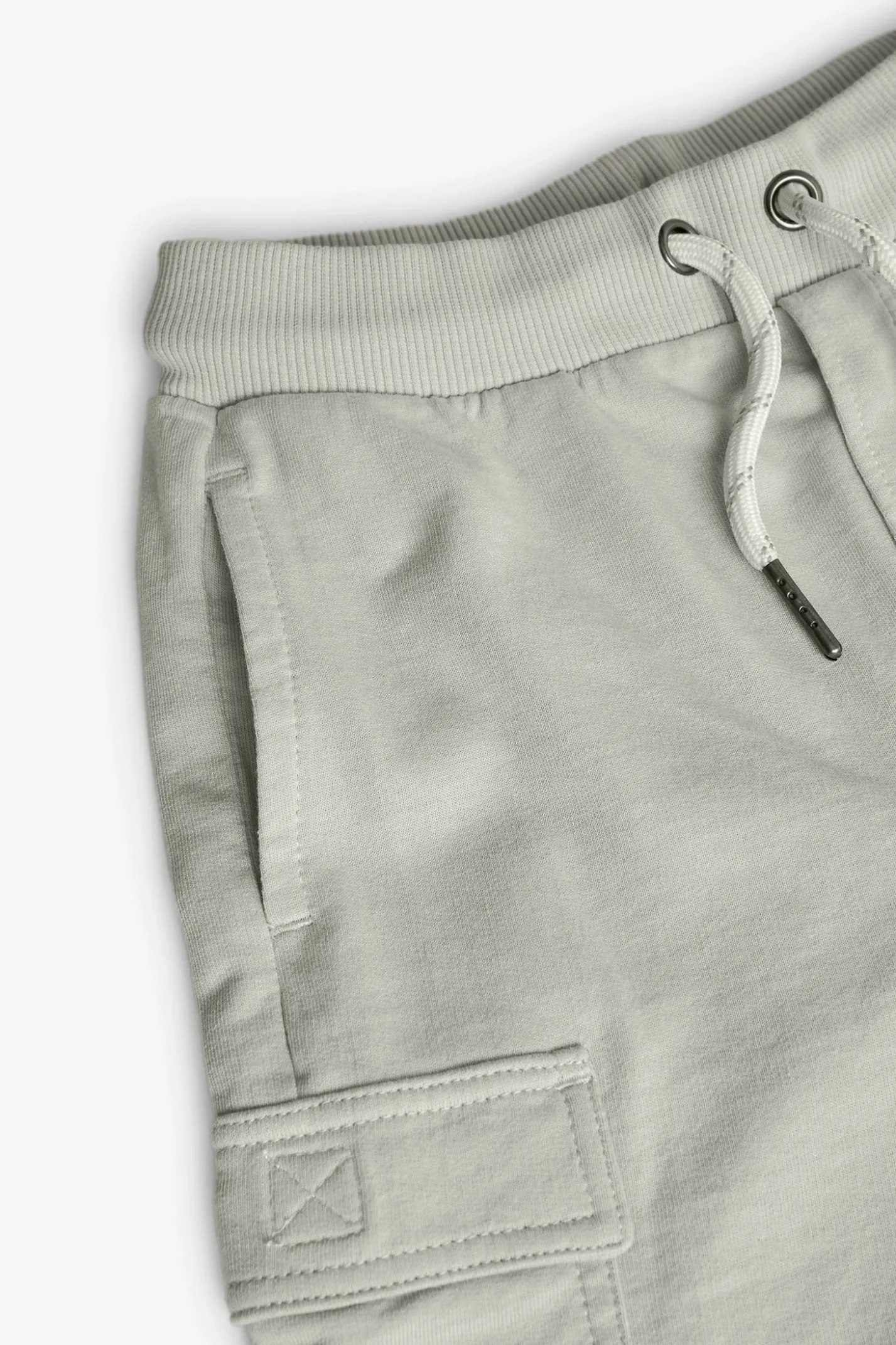 Bermuda in felpa per bambino di colore beige