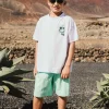 Bermuda in maglia per bambino di colore verde