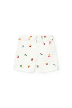 Bermuda in maglia per bambina di colore bianco con motivo floreale.
