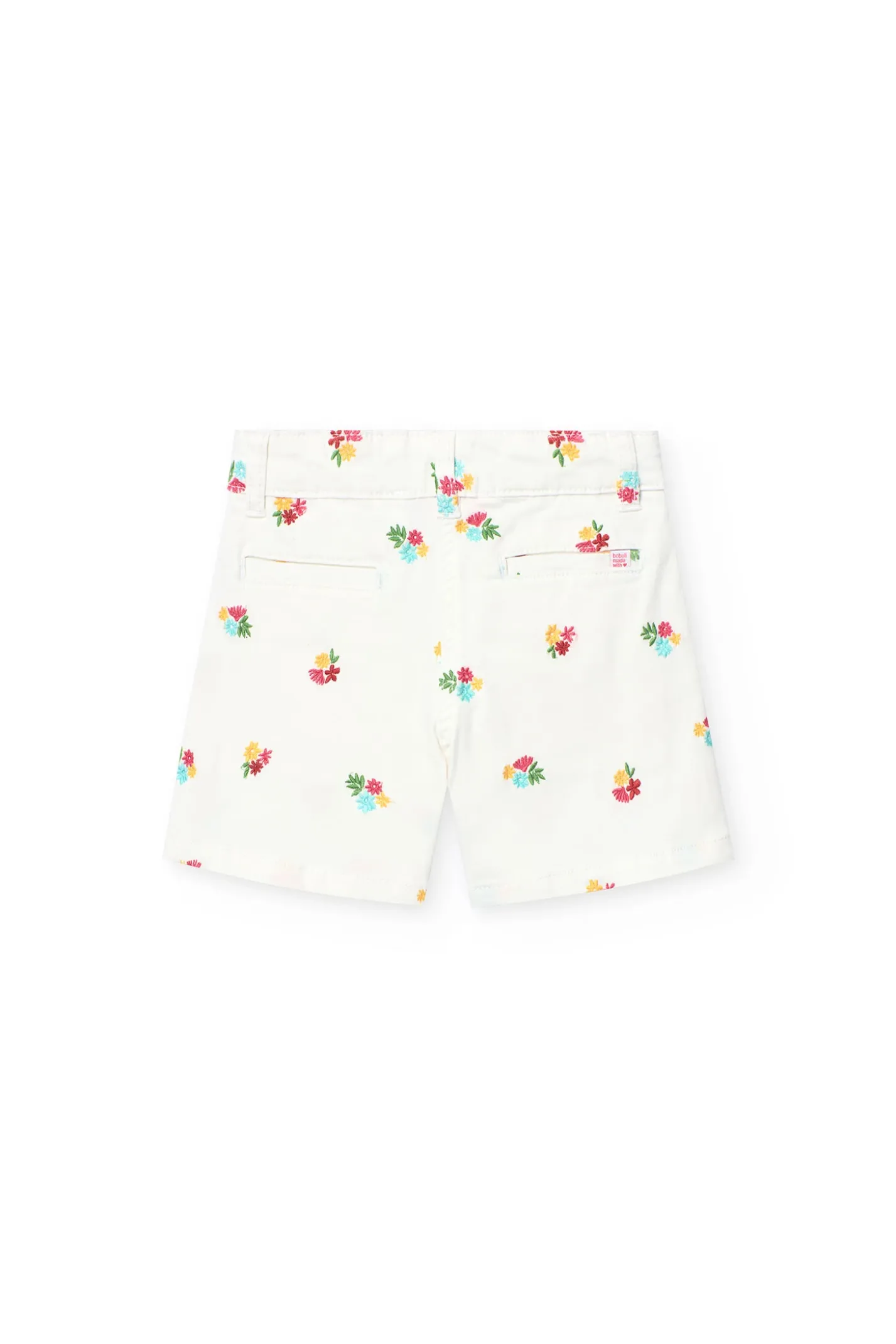 Bermuda in maglia per bambina di colore bianco con motivo floreale.