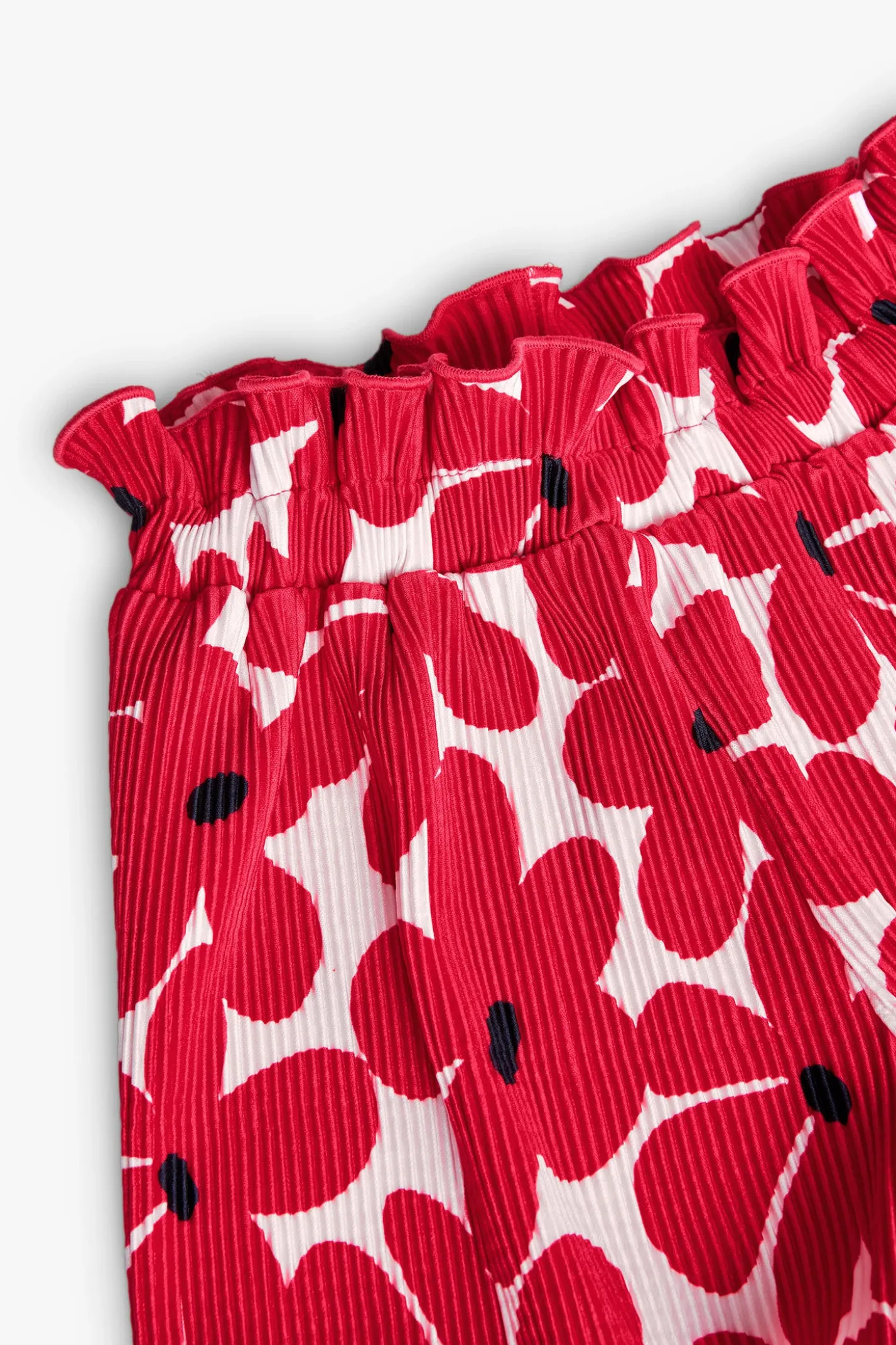 Bermuda in maglia per bambina con stampa di fiori rossi