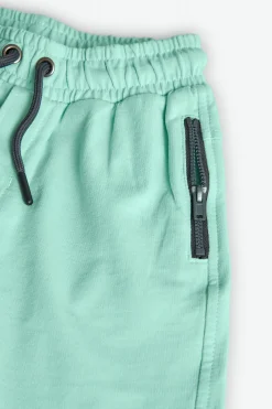 Bermuda in maglia per bambino di colore verde