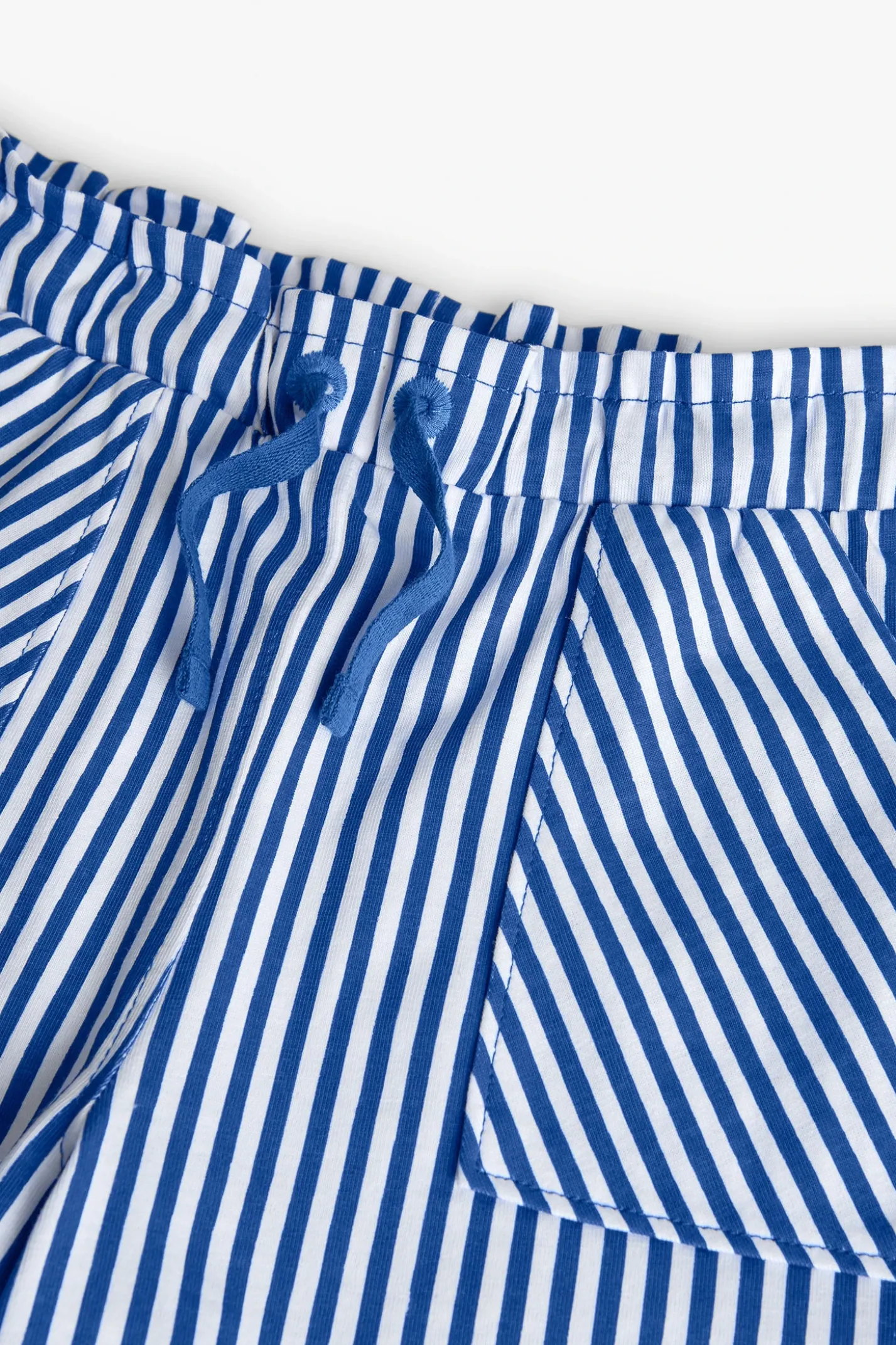 Bermuda in maglia per bambina con stampa a righe in blu e bianco