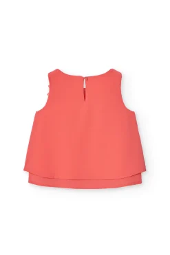 Blusa di chiffon per bambina di colore rosso.