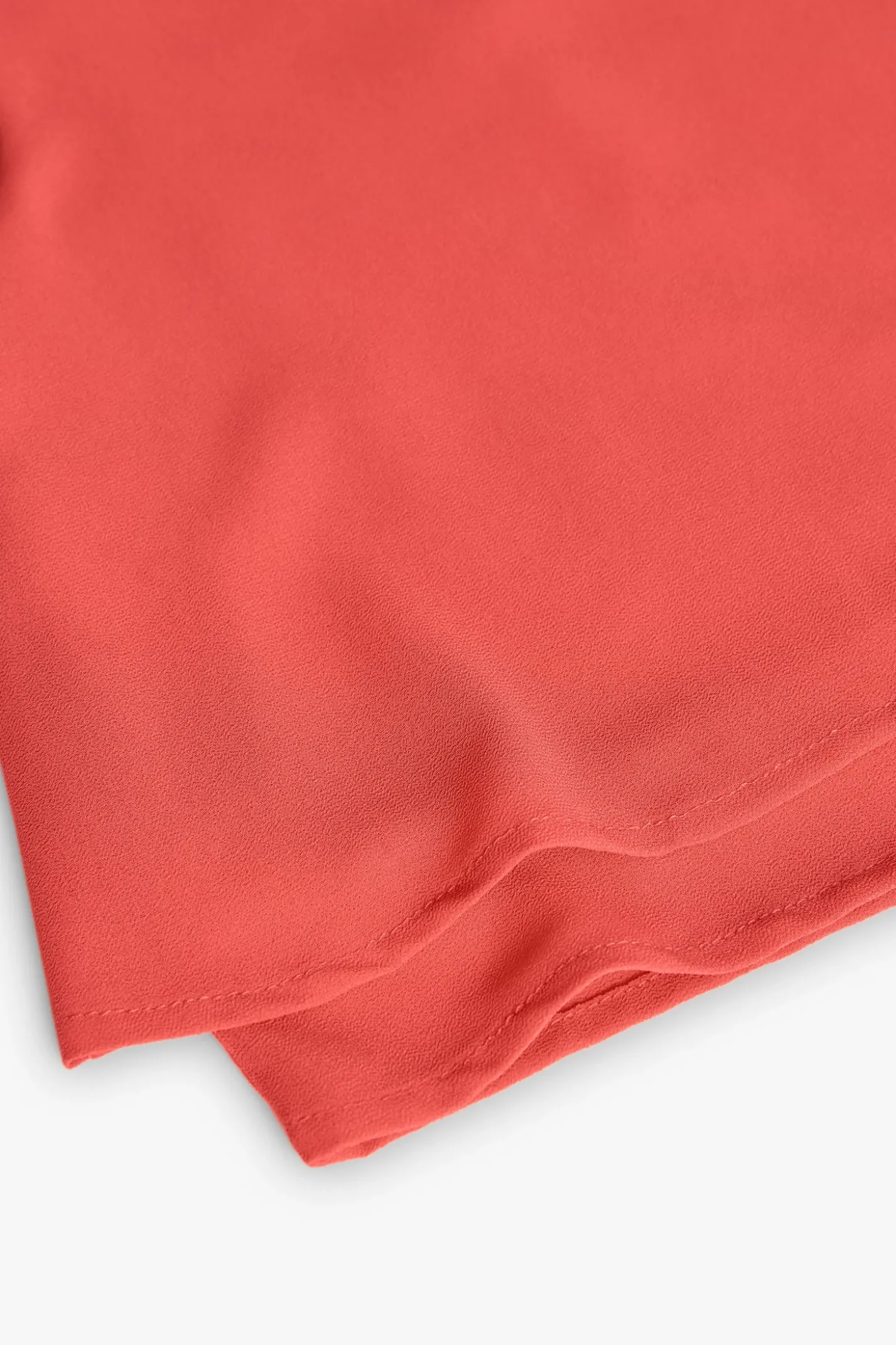 Blusa di chiffon per bambina di colore rosso.