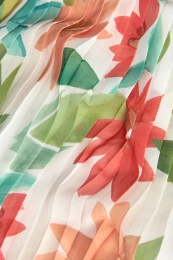 Blusa di chiffon plissettato per bambina con stampa floreale.