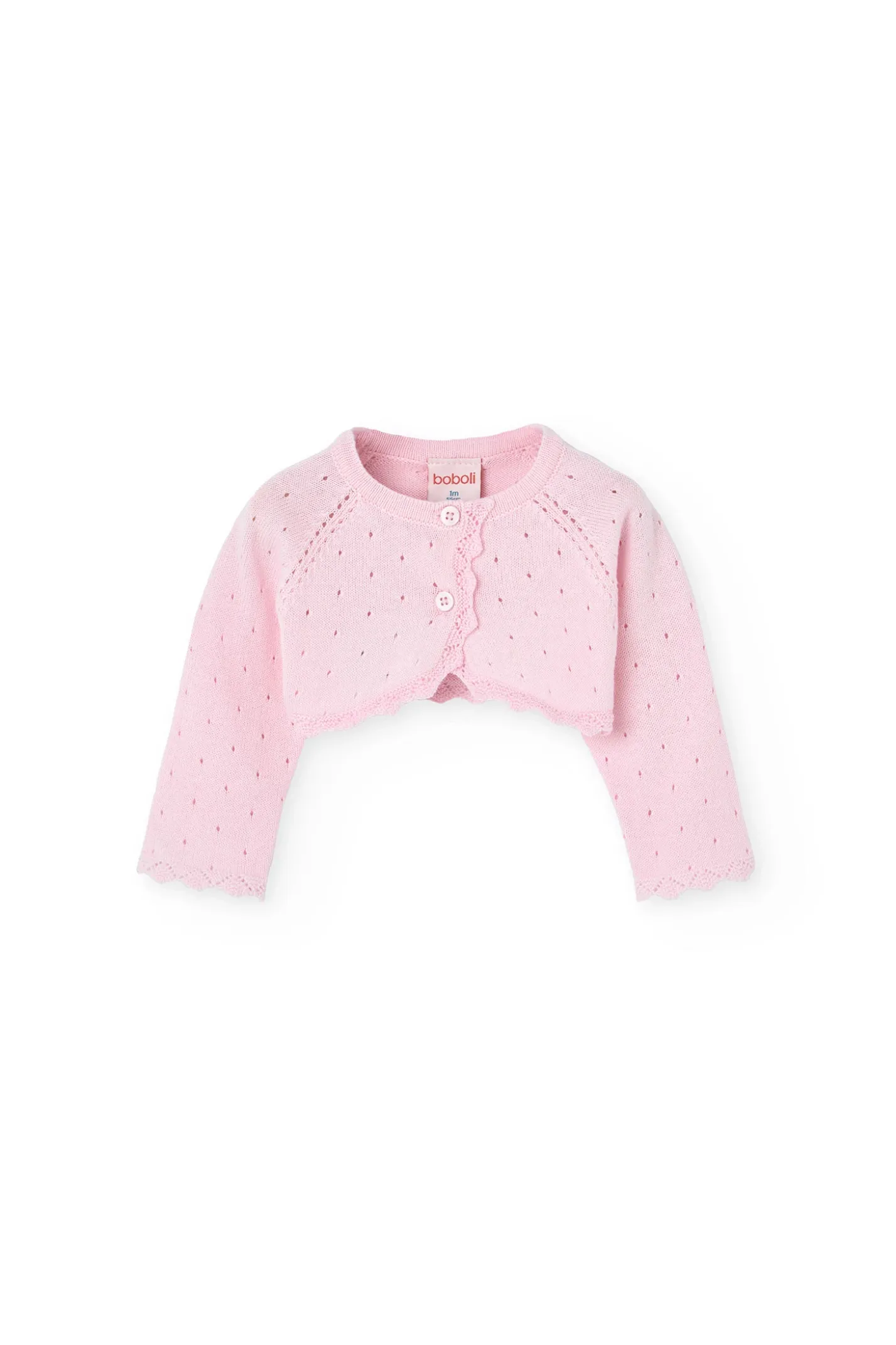 Bolero in maglia per neonata di colore rosa.