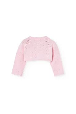 Bolero in maglia per neonata di colore rosa.
