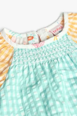 Camicetta in popeline per bambina con motivo a quadri multicolore.