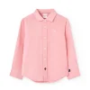 Camicia di lino per bambino a maniche lunghe di colore rosa.