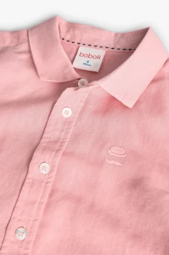 Camicia di lino per bambino a maniche lunghe di colore rosa.