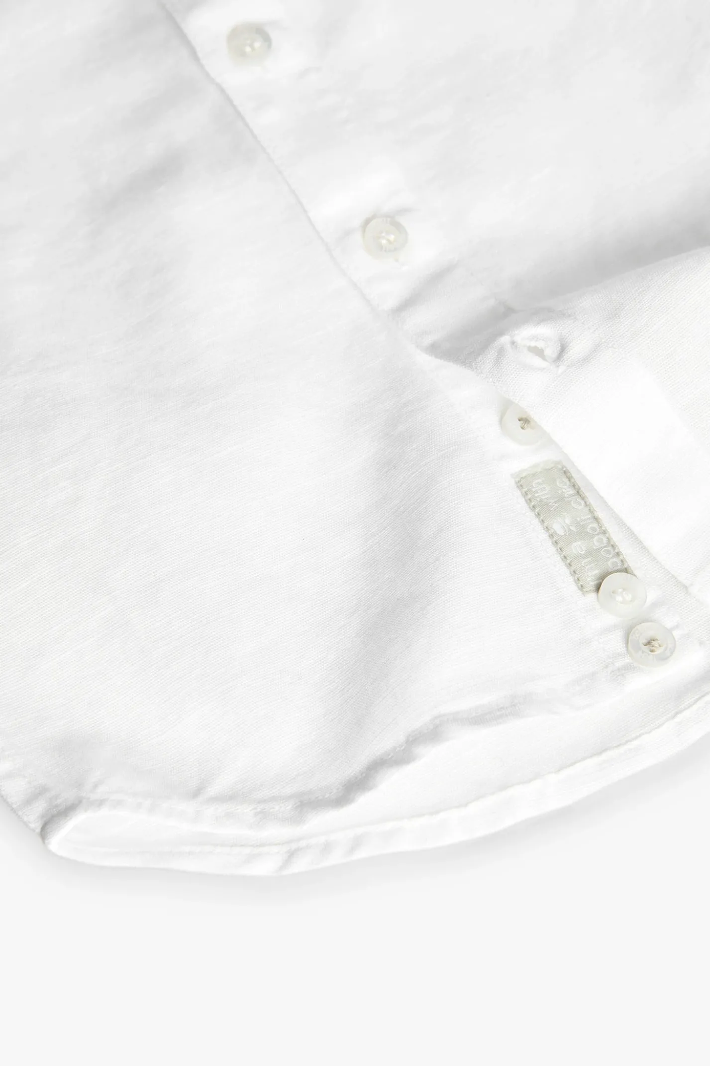 Camicia di lino per neonato a maniche corte in bianco