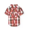 Camicia in popeline per bambino con quadri in tonalità calde.