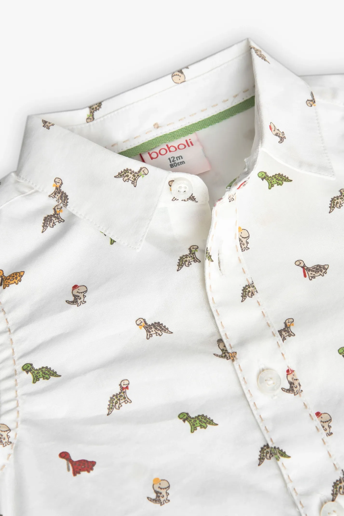 Camicia in popeline per bambini stampata in colore bianco con motivo di dinosauri