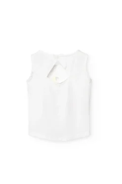 Canottiera a maglia per bambina di colore bianco.
