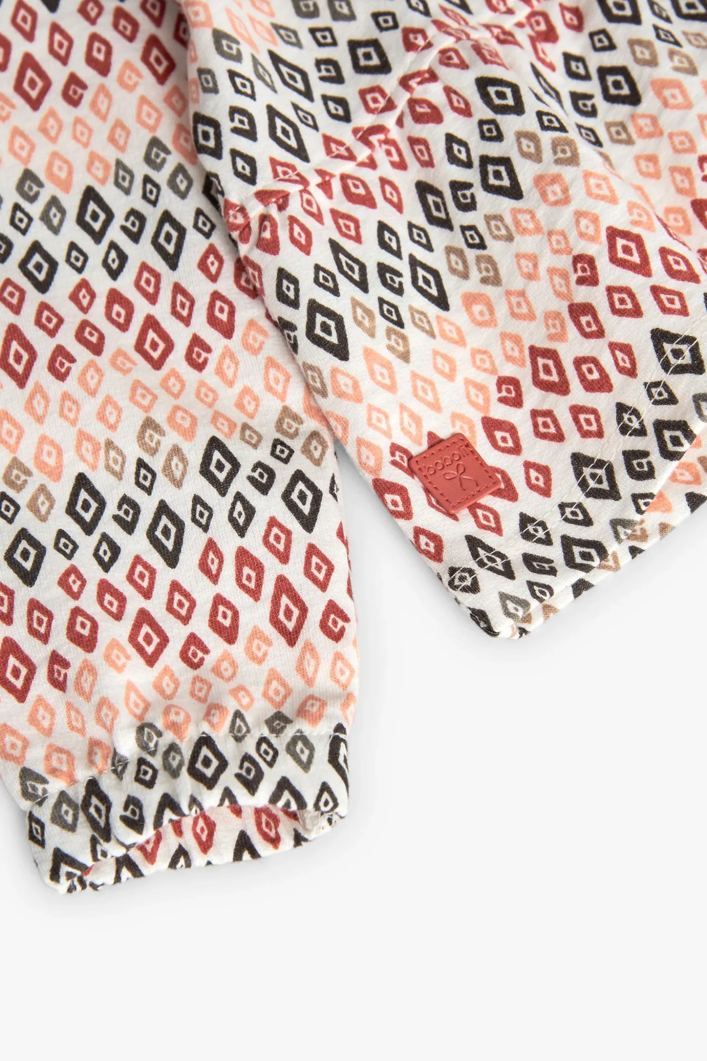 Cardigan per neonata con stampa multicolore.