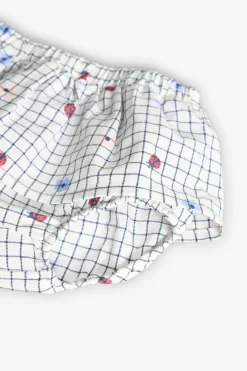 Completo coordinato in maglia per bambina in rosa con stampa di coccinella.