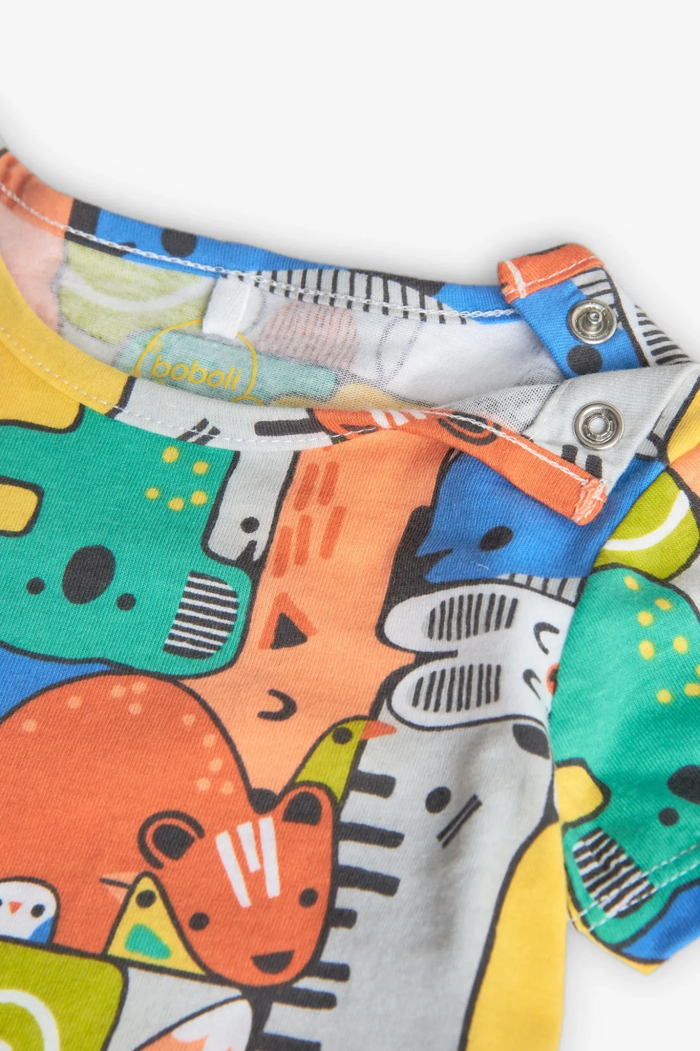 Completo di maglietta a maglia per neonato di colore giallo con stampa.