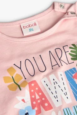 Completo di maglietta e leggings in maglia per bambina in rosa con stampa.