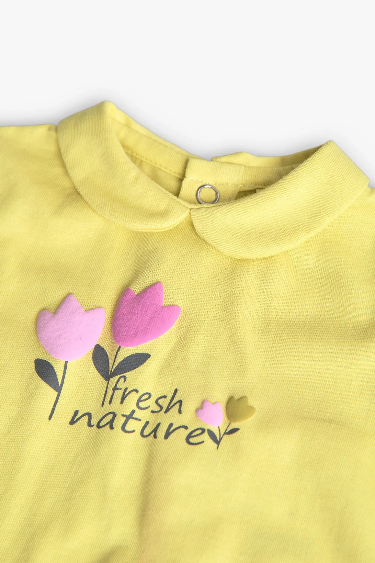 Completo di maglietta e pantalone a maglia per neonata in colore verde con stampa floreale.