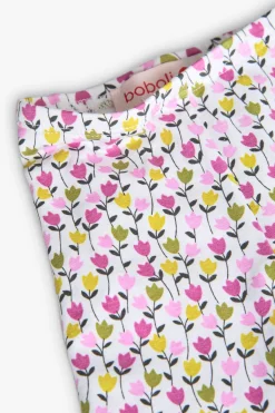 Completo di maglietta e pantalone a maglia per neonata in colore verde con stampa floreale.
