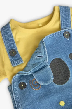 Completo di t-shirt in maglia per neonato di colore giallo.