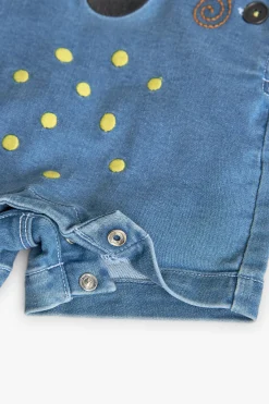 Completo di t-shirt in maglia per neonato di colore giallo.