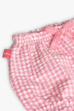 Completo in maglia per bambina neonata in colore bianco