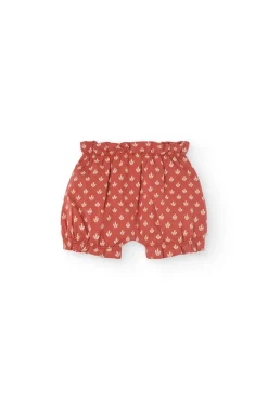 Completo in maglia per neonata con stampa floreale in rosso.