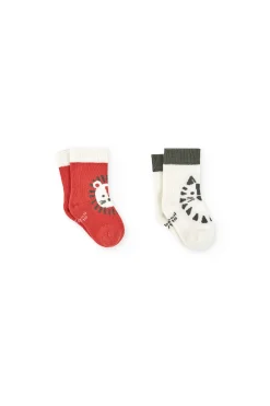 Confezione di calzini a maglia per bambino in colore arancione.