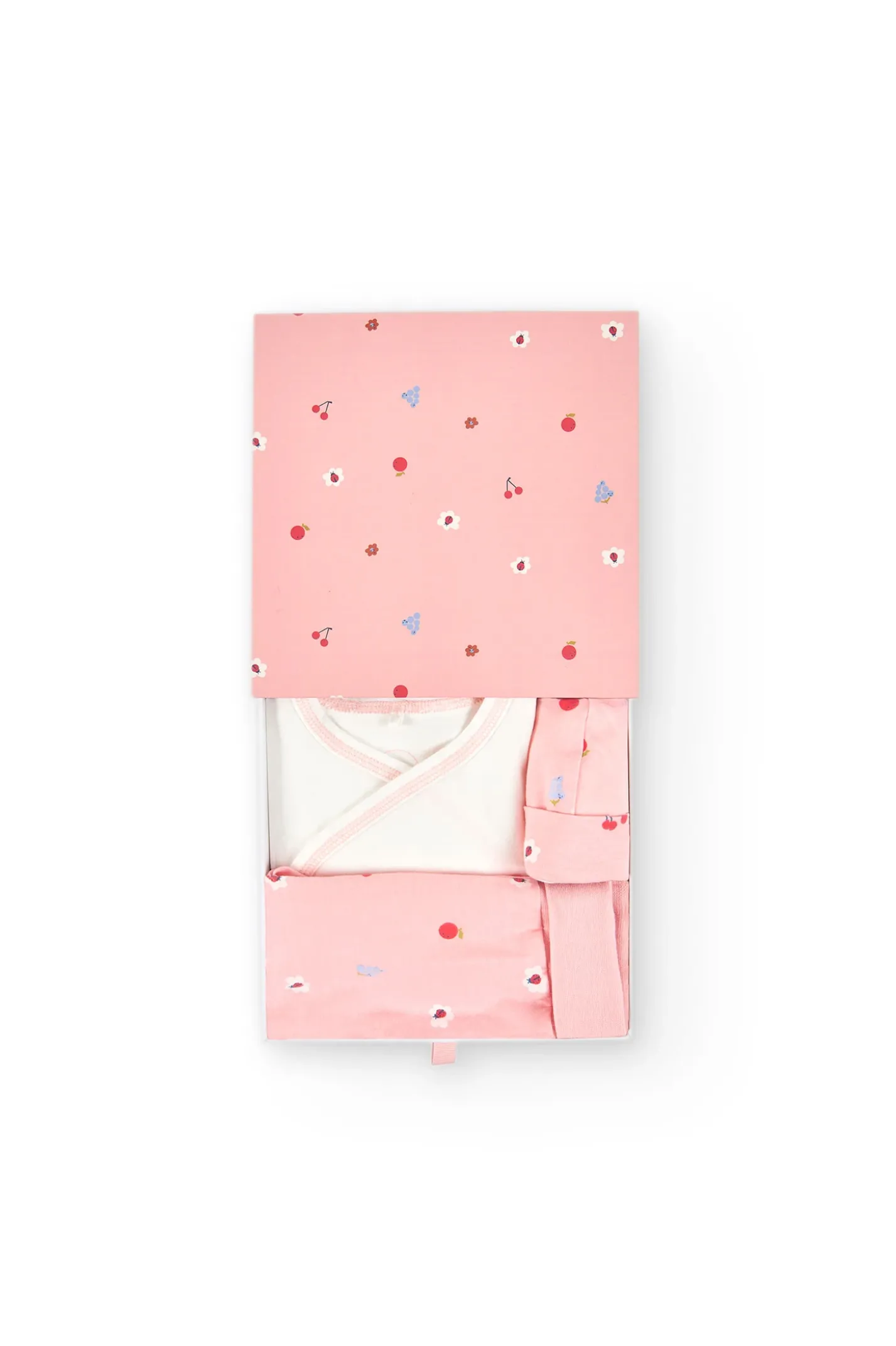 Coordinato in maglia per bambina in bianco e rosa.