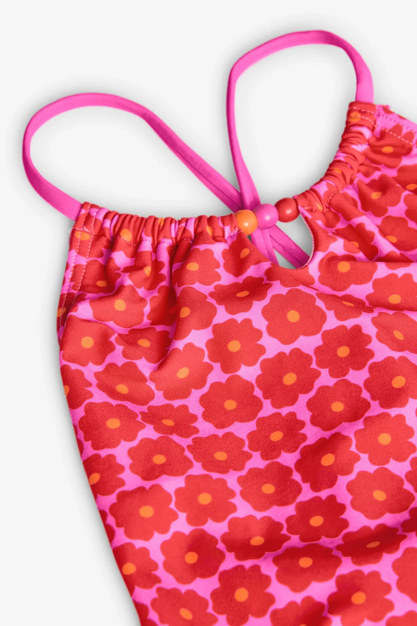 Costume da bagno in poliammide per bambina con stampa floreale in rosa.