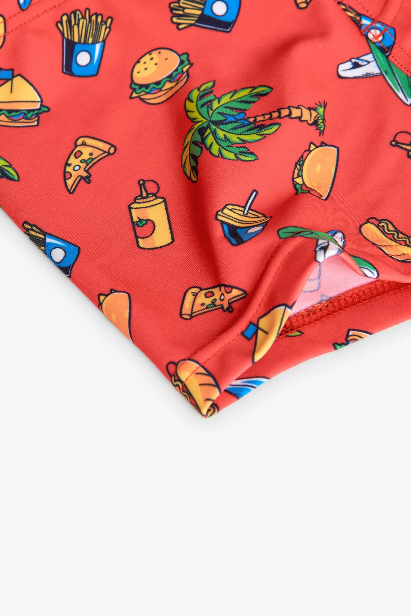 Costume da bagno in poliammide per bambino di colore rosso.