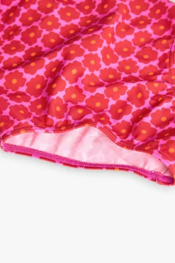 Costume da bagno in poliammide per bambina con stampa floreale in rosa.