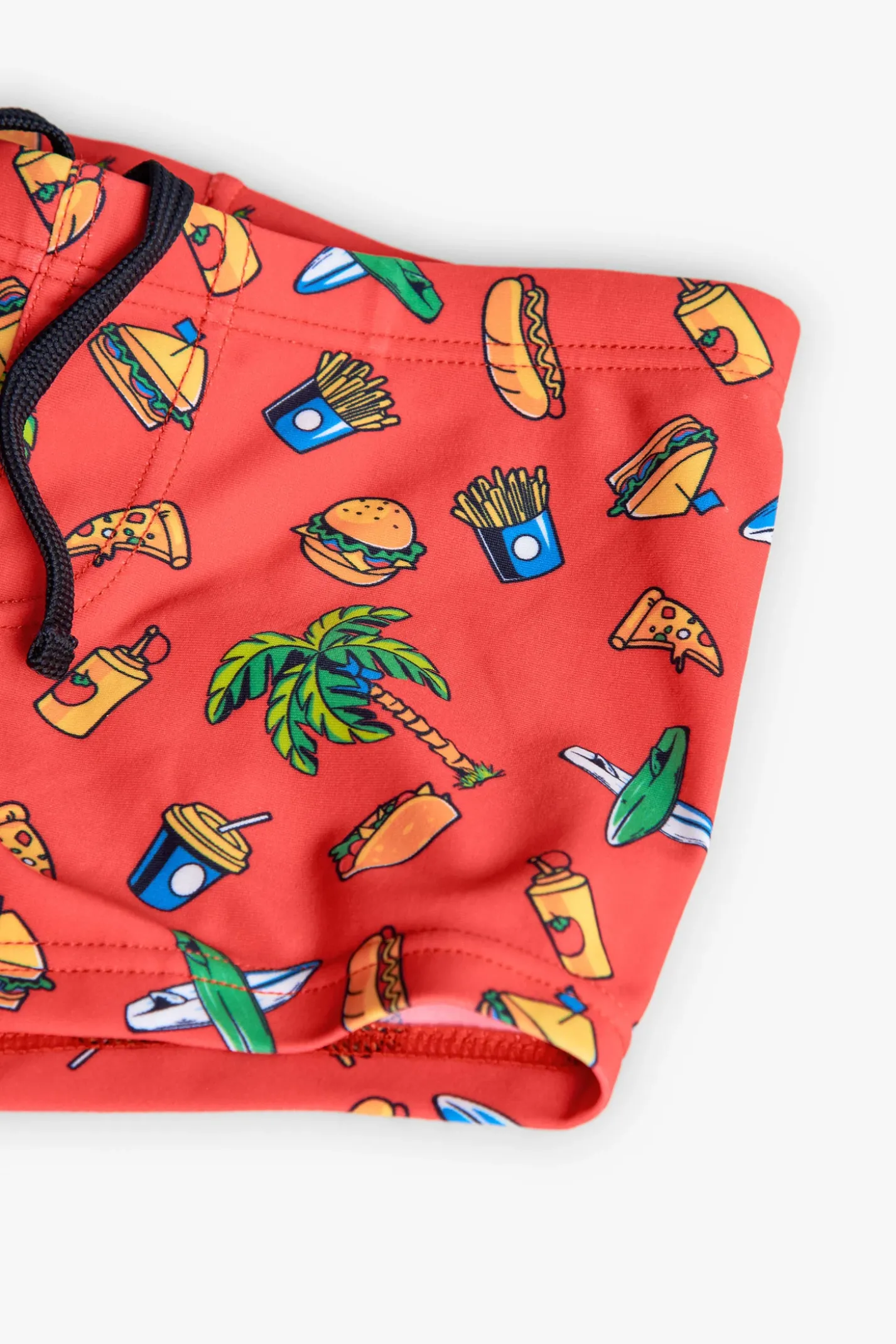 Costume da bagno in poliammide per bambino di colore rosso.
