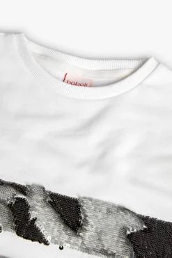 Felpa per bambina di colore bianco.