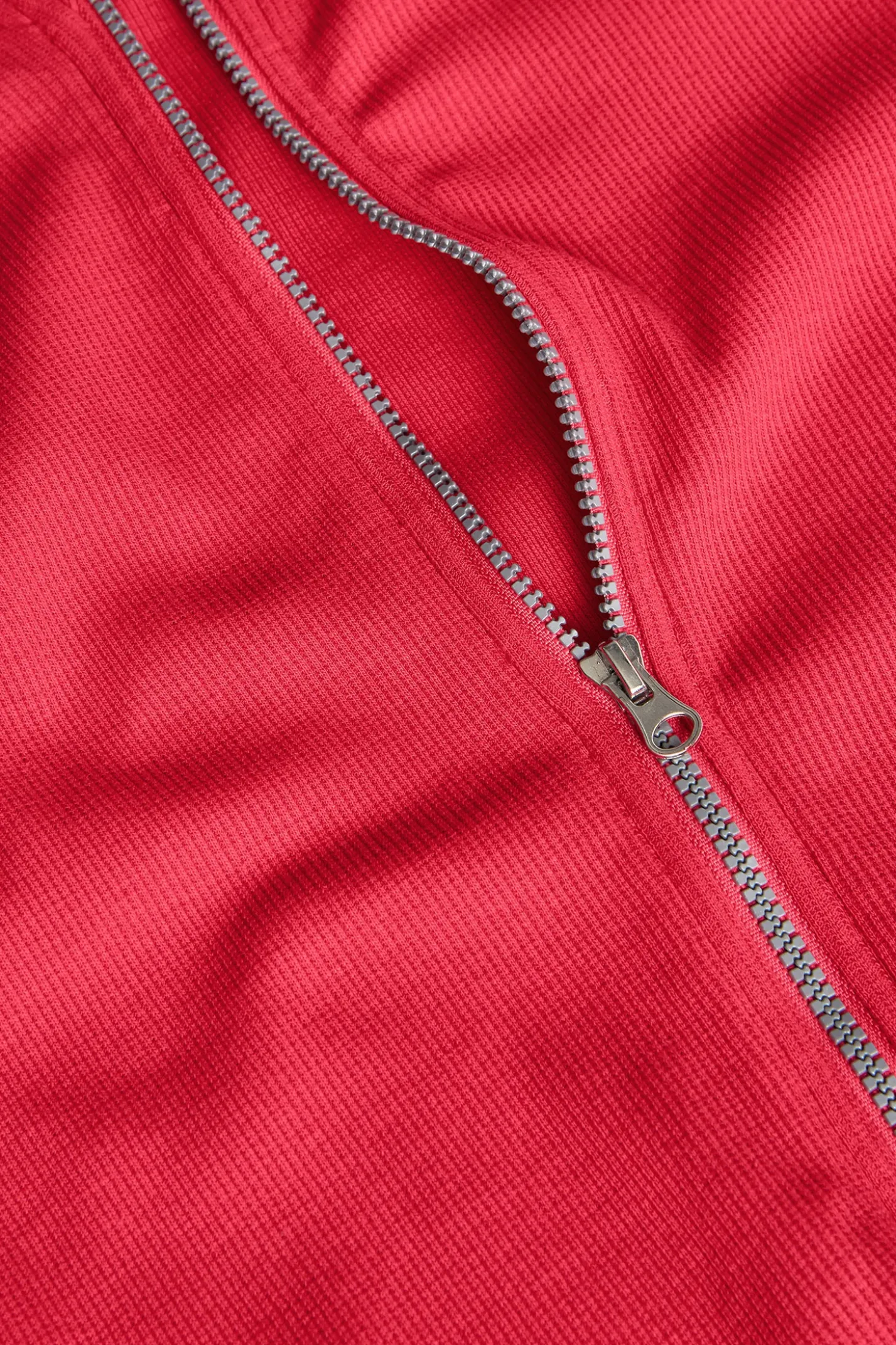 Giacca basica in maglia per bambina color fragola.