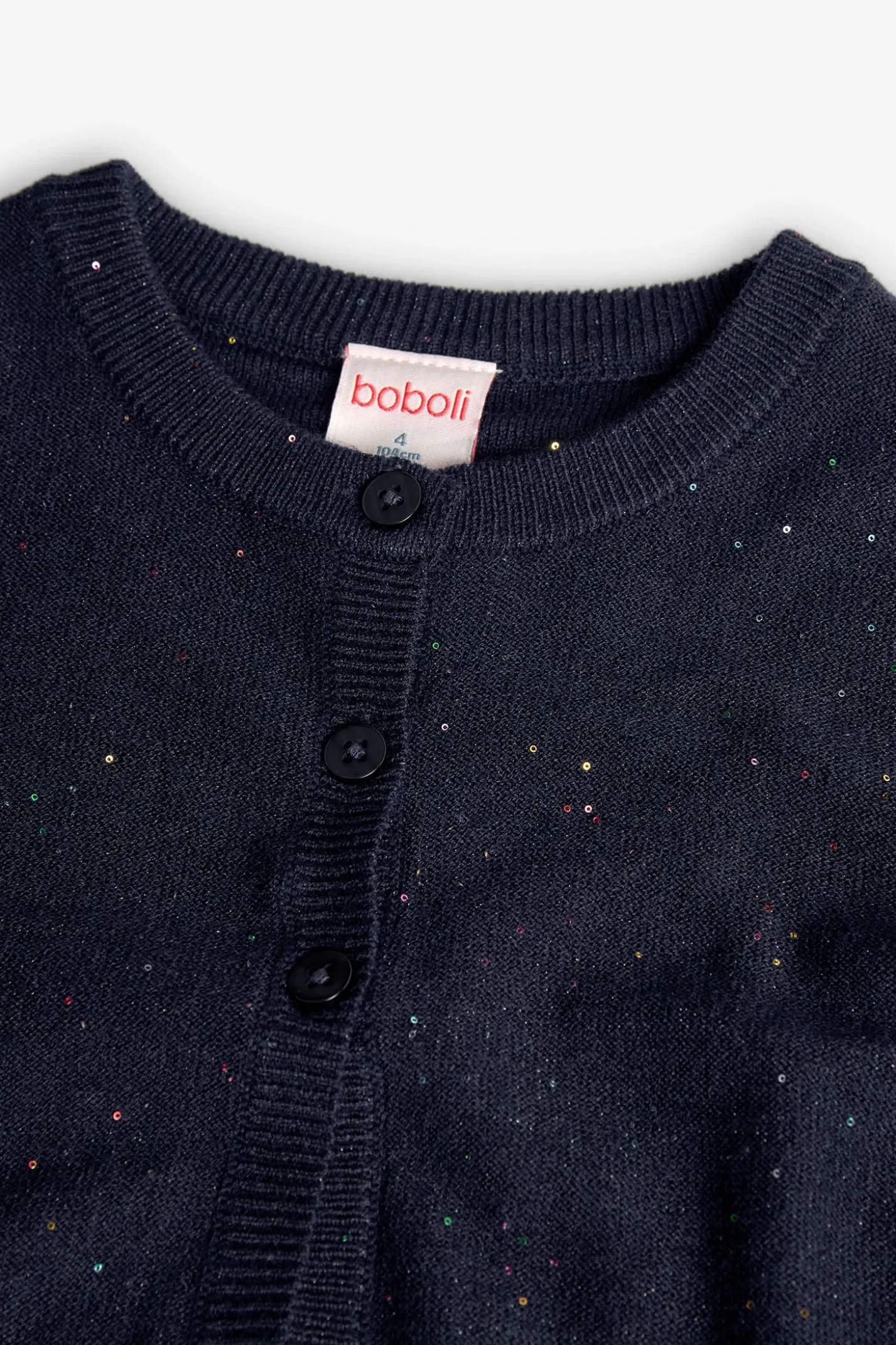 Giacca in maglia per bambina di colore blu marino.