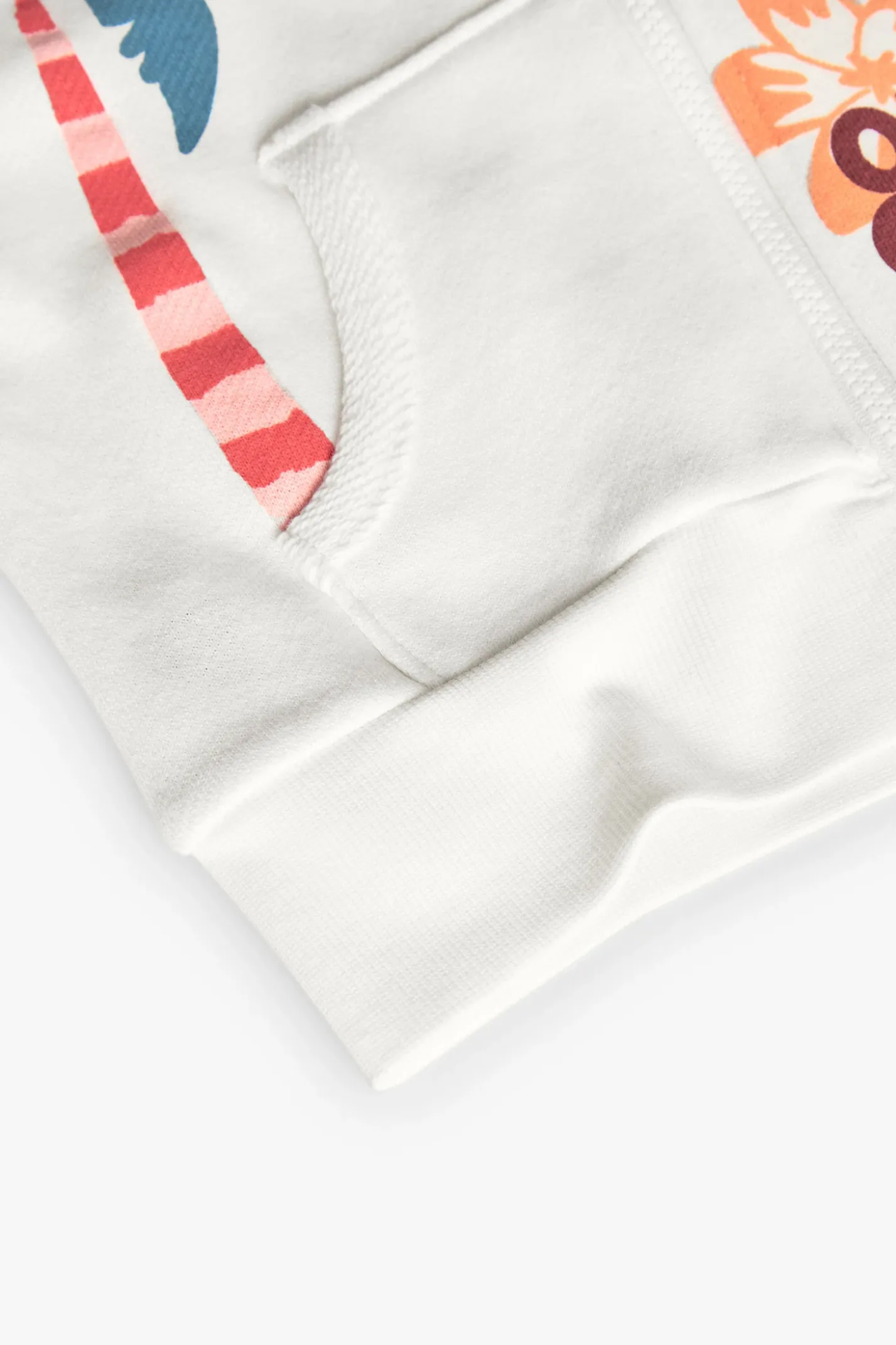 Giacca in maglia per bambina di colore bianco con cappuccio