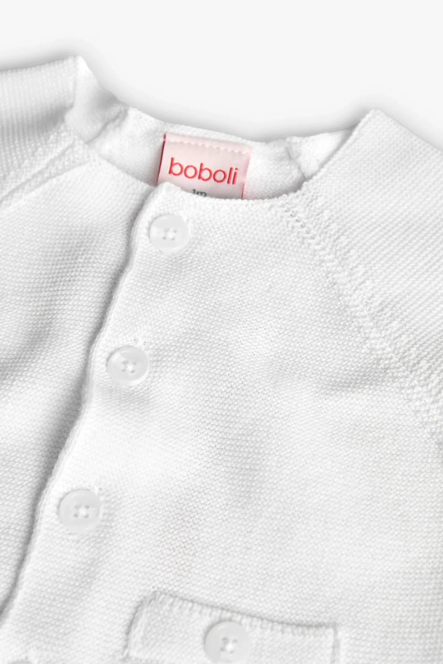 Giacca in maglia per neonato di colore bianco