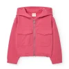Giacca in pile con cappuccio per bambina color fragola.