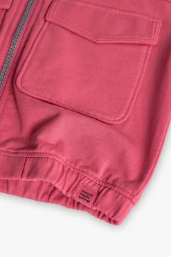 Giacca in pile con cappuccio per bambina color fragola.