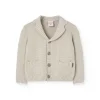 Giacchetta in maglia per neonato di colore beige.