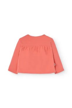 Giacchetta reversibile in maglia per bambina nei colori rosso e rosa