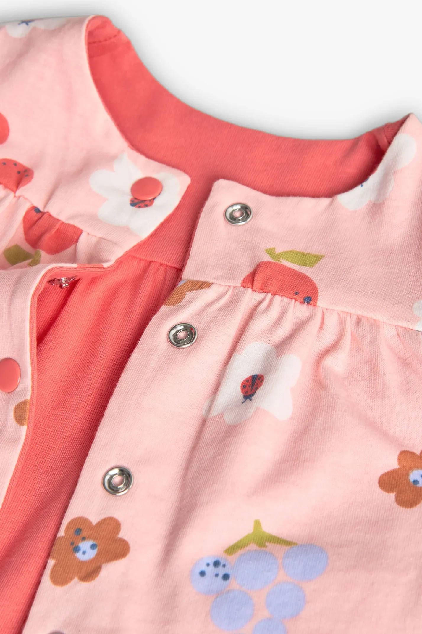 Giacchetta reversibile in maglia per bambina nei colori rosso e rosa