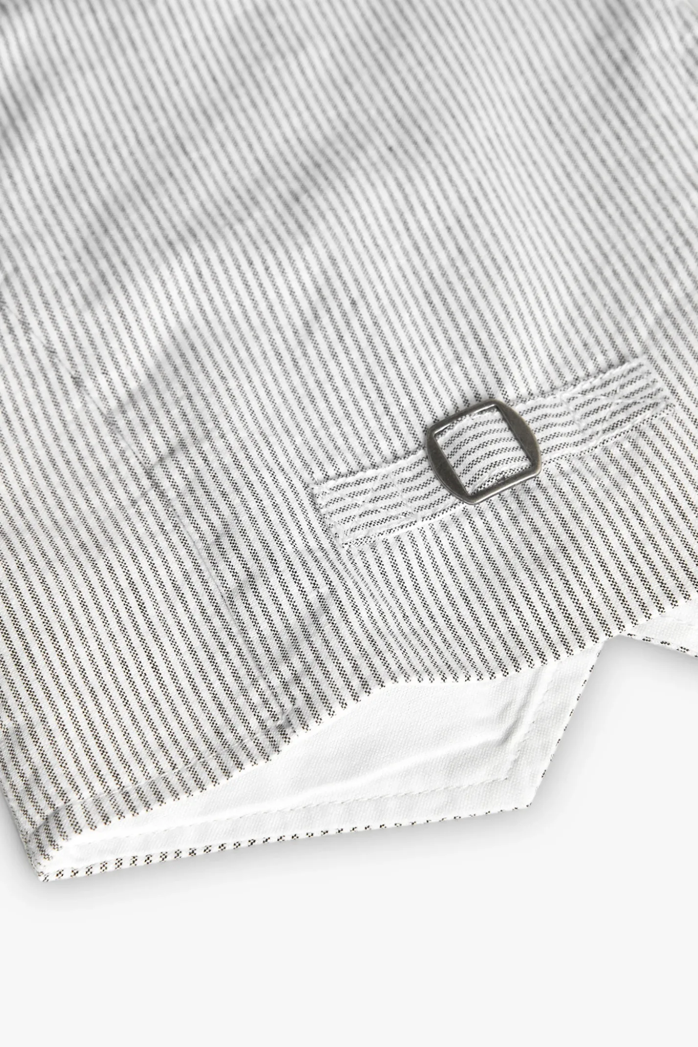 Gilet oxford per bambino a righe grigie e bianche.